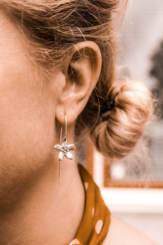 Solid Sterling Silver Hoya flower drop earrings.